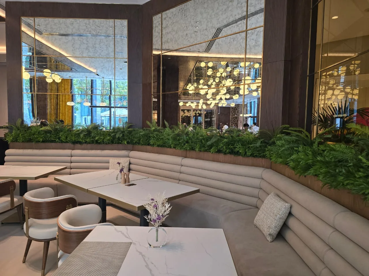 Real completed project: fern planter divider along a restaurant booth