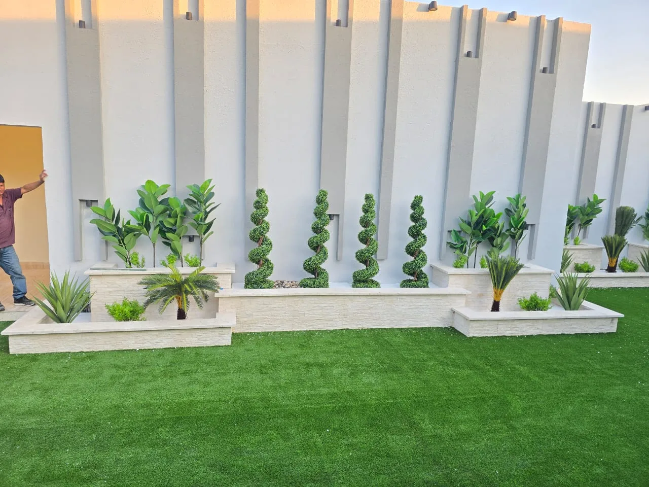 Real completed project: villa backyard artificial grass and topiary garden